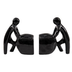 Man Pushing Stone Bookends - set of 2